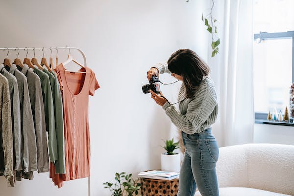 A girl taking photos for the promotion of products