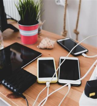 What are the risks of using public charging stations?