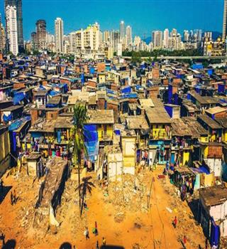 Why do most tourists visit Mumbai Dharavi slums?